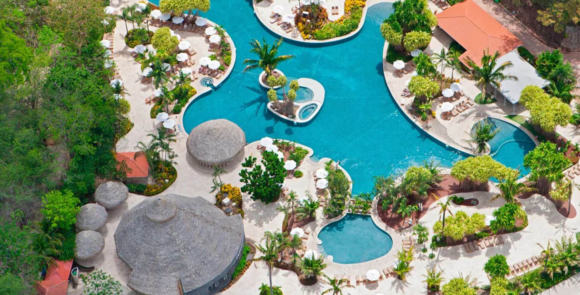 Aerial view of a large pool in a resort
